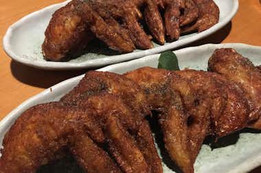 居酒屋  エビス西八王子総本店の口コミ評価評判秘伝の手羽先唐揚げ　黒